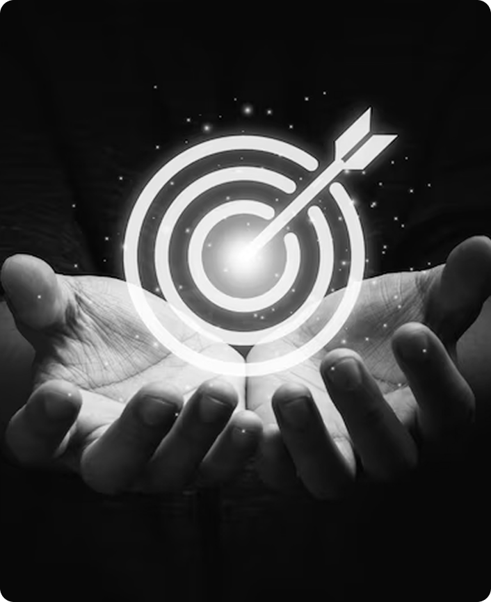 Hands holding a glowing target and arrow icon, symbolizing product focus, strategic alignment, and execution accuracy.
