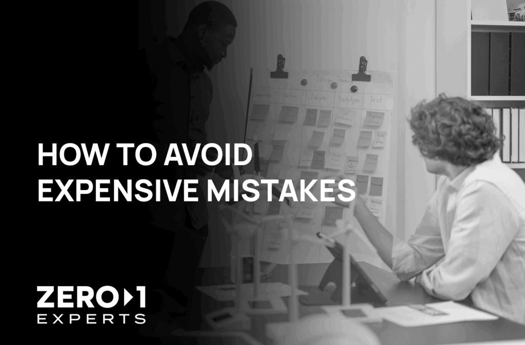 Two professionals reviewing a product roadmap to prevent costly errors through expert Fractional CTO and Product Management oversight.